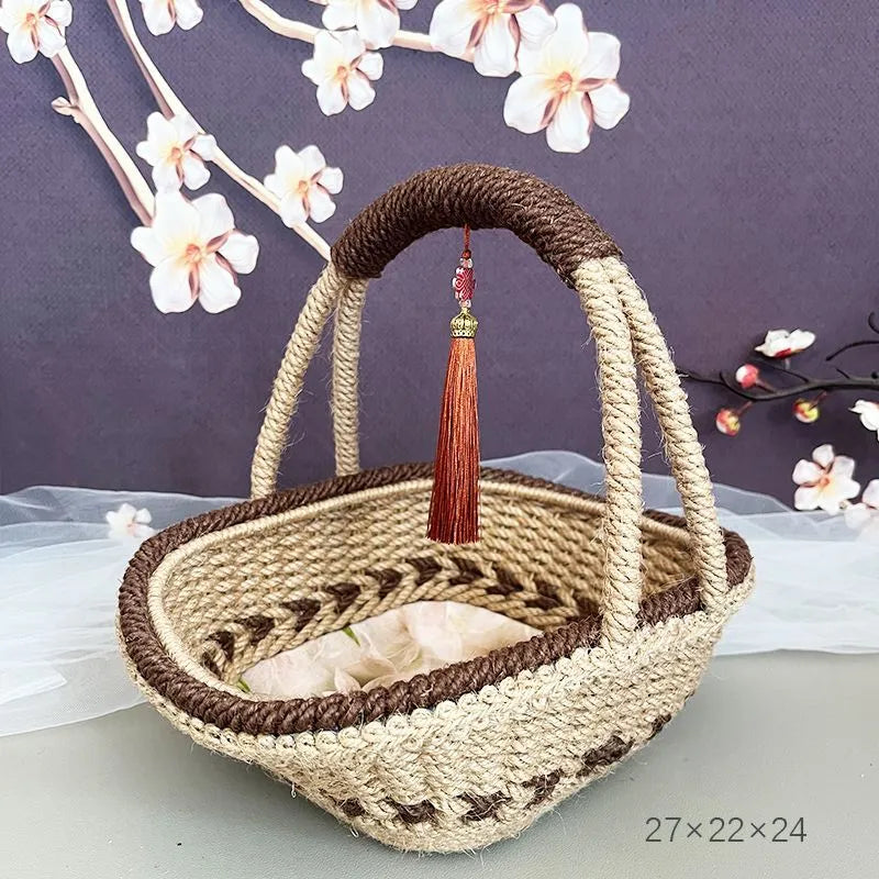 Coffee brown hand-woven hemp rope basket measuring 19 by 12 centimetres.