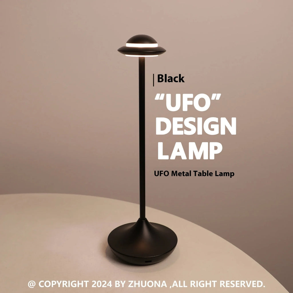 Black UFO-shaped metal desk lamp with touch dimming and three colour light modes