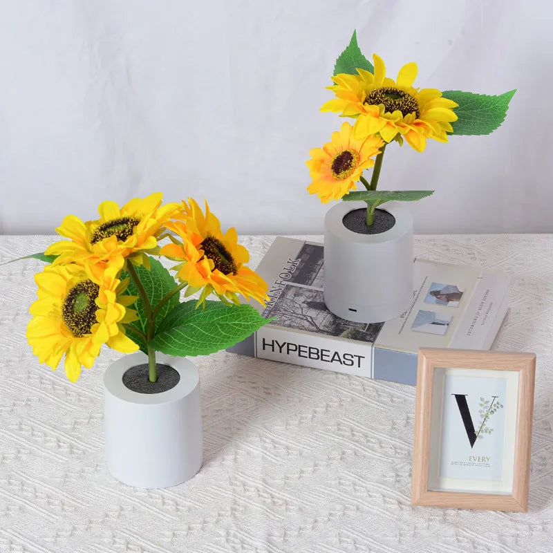 USB rechargeable artificial sunflower LED night light on table with decorative flower design