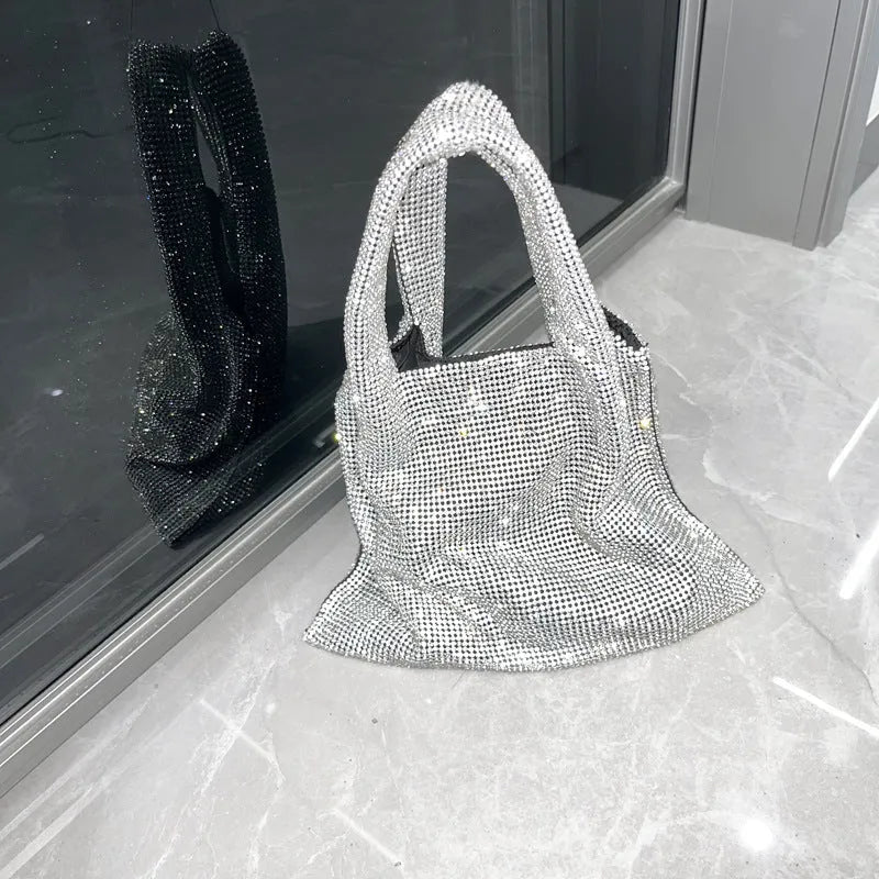 Silver rhinestone handbag with cotton thread body and open outer pocket for dinner and party use