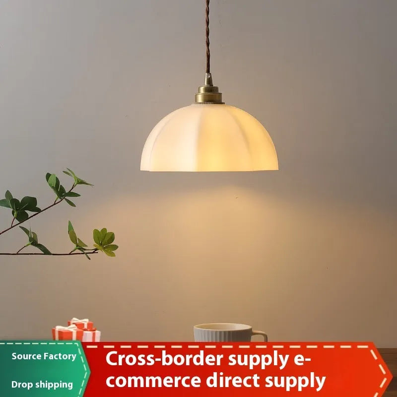 Brass Chinese-style pendant light with copper glass shade for indoor ceiling mounting