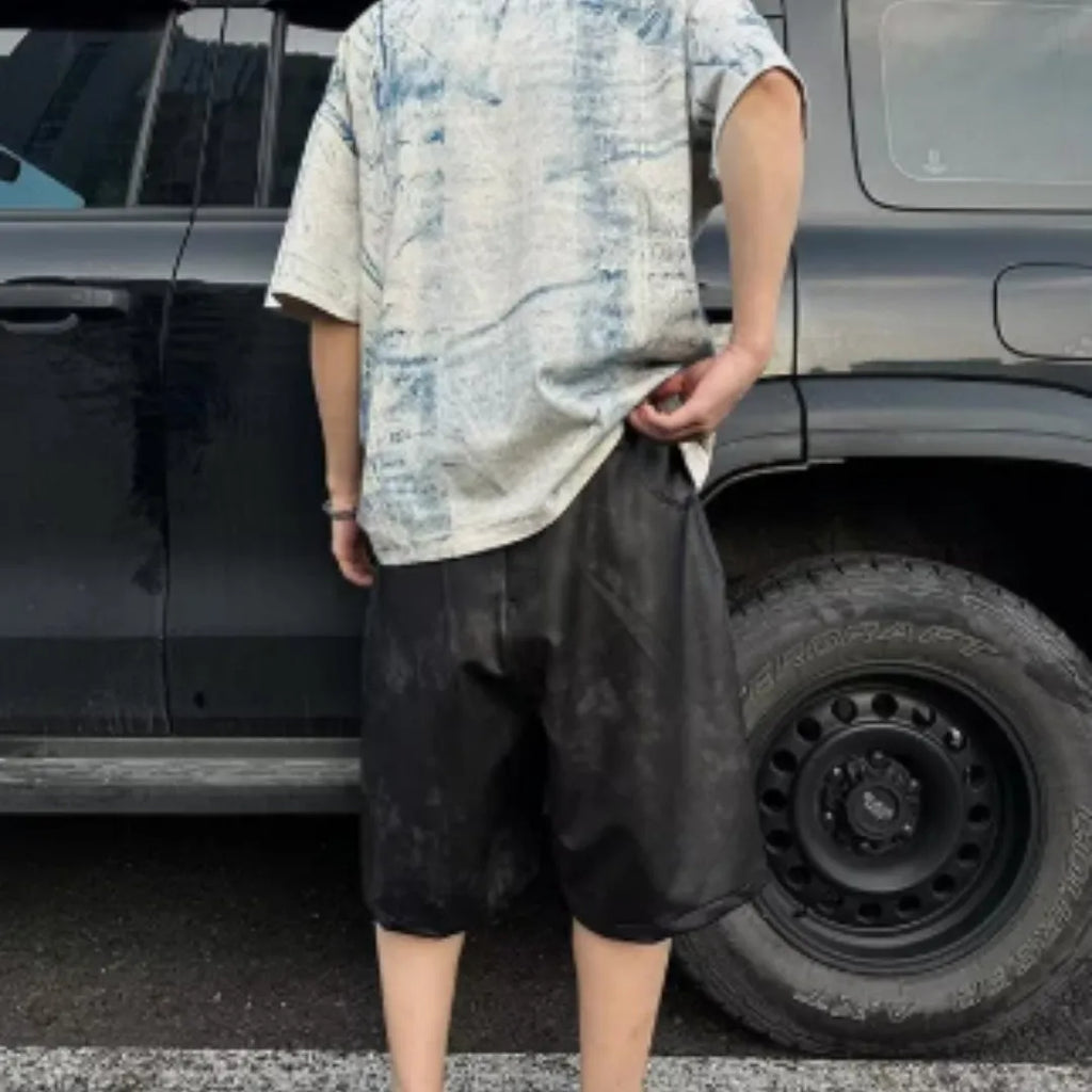 Korean-style solid colour loose fit round neck T-shirt on a hanger, front view.