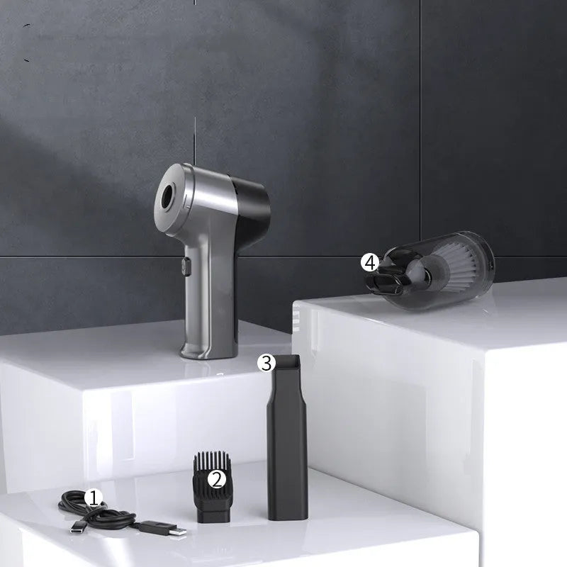 Handheld cordless vacuum cleaner unit for use in cars and homes, showing its portable design.