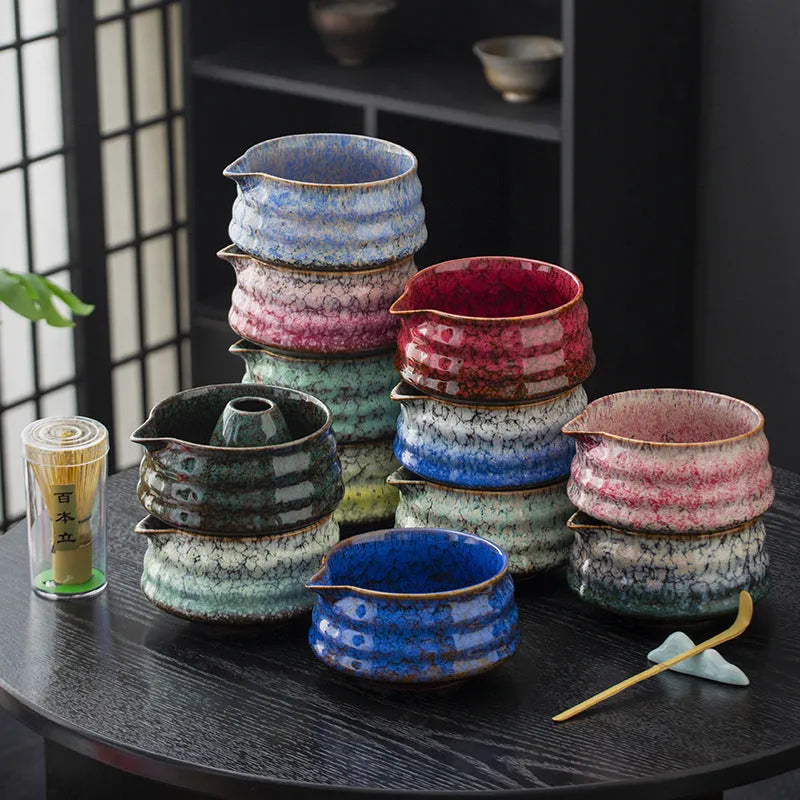 Seven-piece Japanese style matcha set with ceramic bowl, bamboo whisk, stand, tea tray, filter screen, and tea towel in gift box