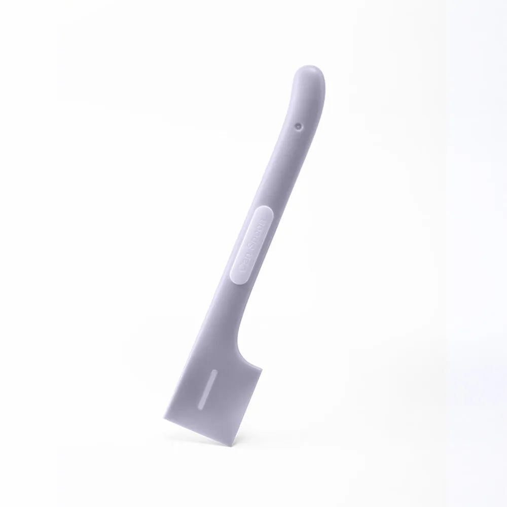 Green long-handled pet food spoon with right-angle head for scraping canned wet food.