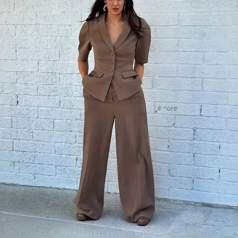 Brown men's slim fit polyester suit with long sleeves on a hanger