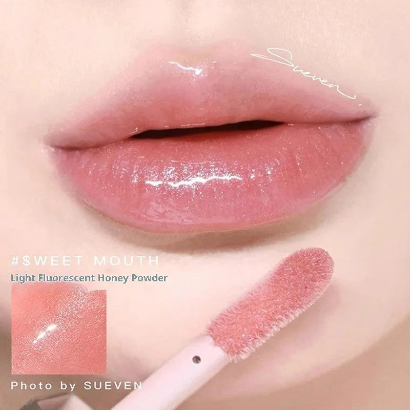 Mirror Water Light Highlight Lip Lacquer lip gloss tube with wand applicator in streamer 01 Fenty Glow