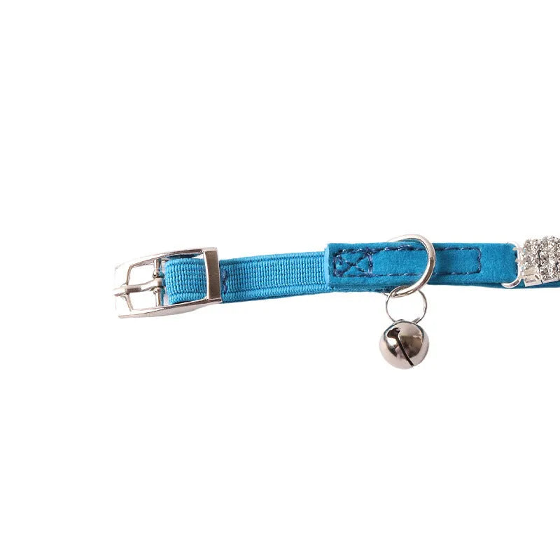 Flocked flannel cat collar with elastic buckle and gang drill pattern in multiple colours.
