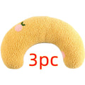 White U-shaped plush pet pillow for a cat, showing its donut shape and quilted texture.