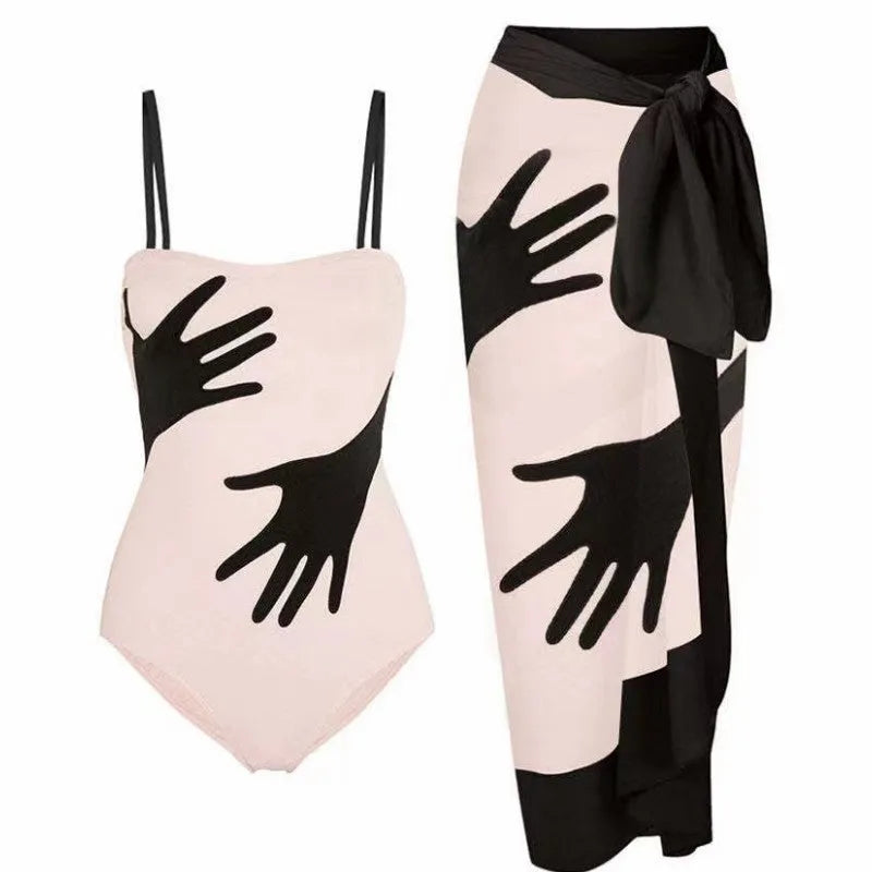 Women's one-piece bikini swimsuit with a gauze skirt attached, shown in available colours.