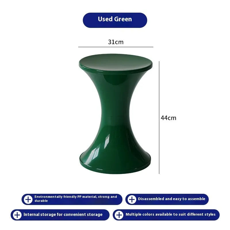 Hourglass-shaped plastic shoe changing stool in a choice of five colours: black, green, red, white, brown.