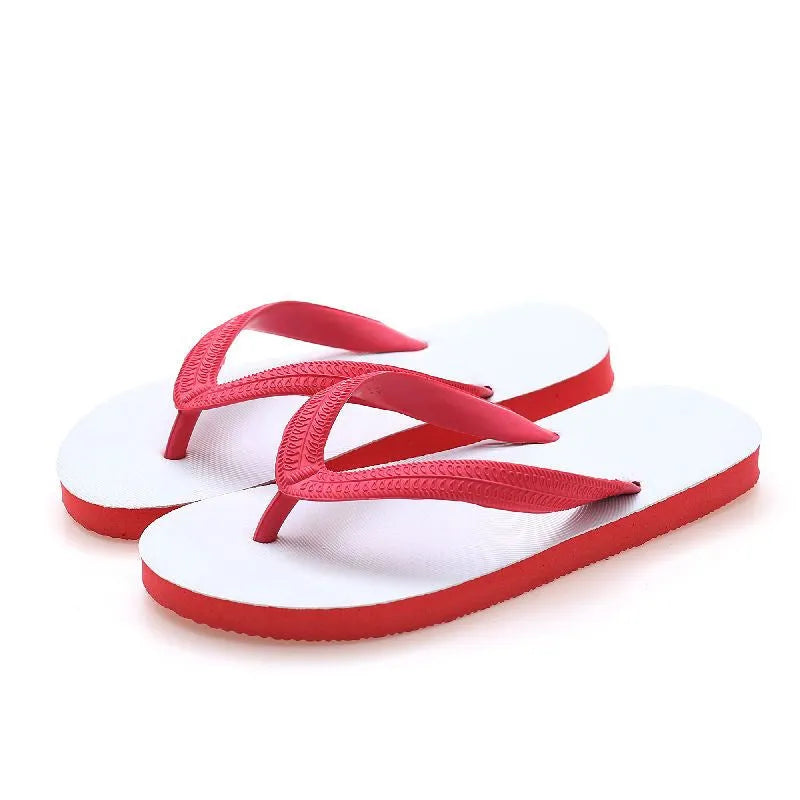 A pair of rubber flip-flops with a fish label on the strap, showcasing a non-slip patterned sole.