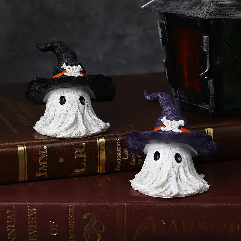 A detailed resin wizard hat ornament with a ghost theme in either kid-purple or black colour.