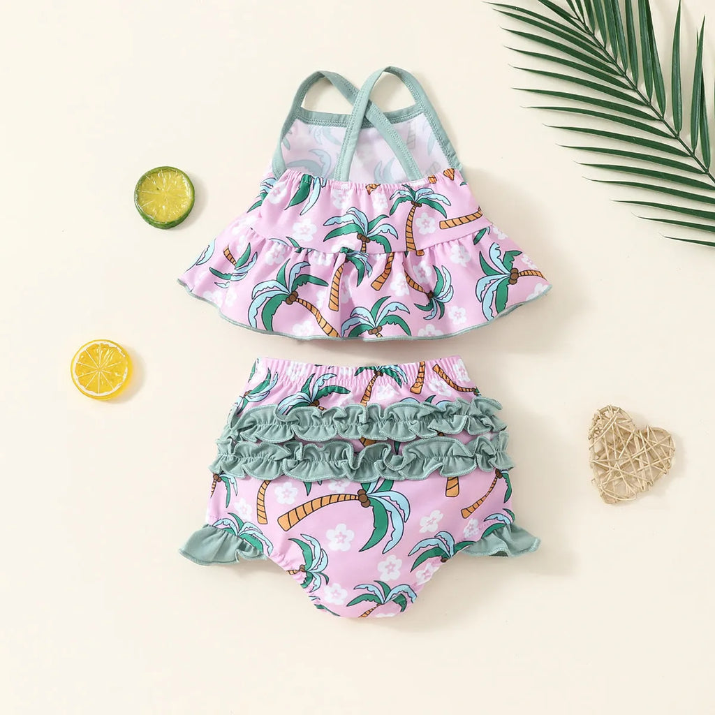 White children's sweet style swimsuit set with shirt and shorts on a hanger.