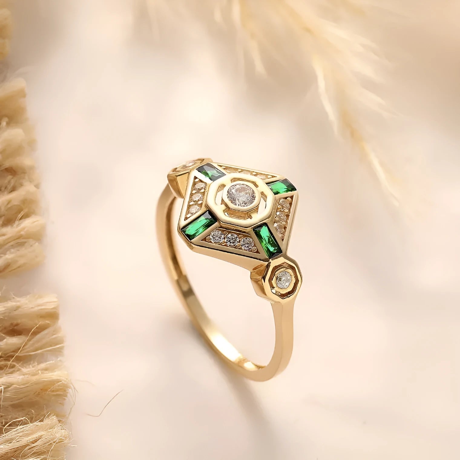 Emerald green geometric square-cut women's diamond ring with electroplated finish on a plain background.