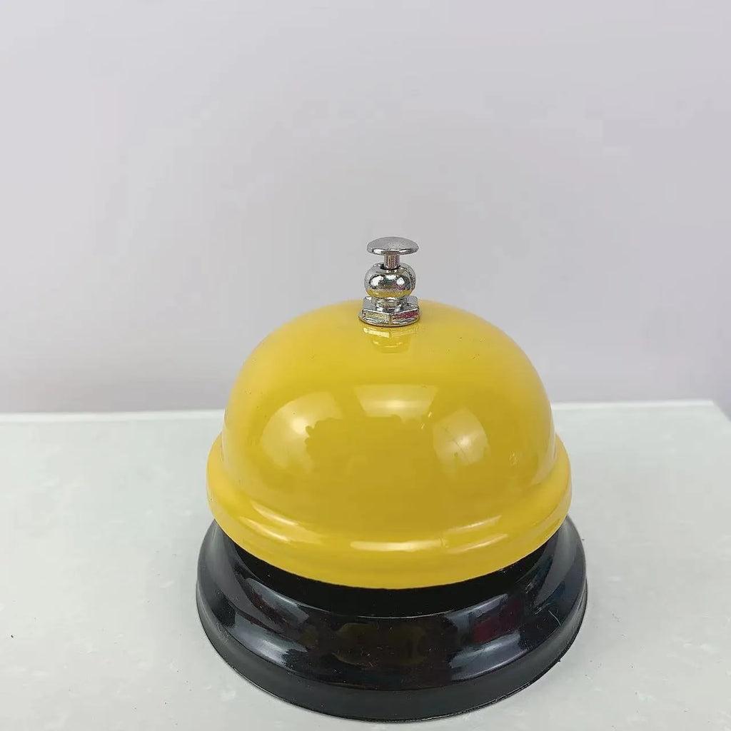 Iron game bell shown in one of ten available colours: blue, green, pink, red, yellow, green tea, or rose kiss.