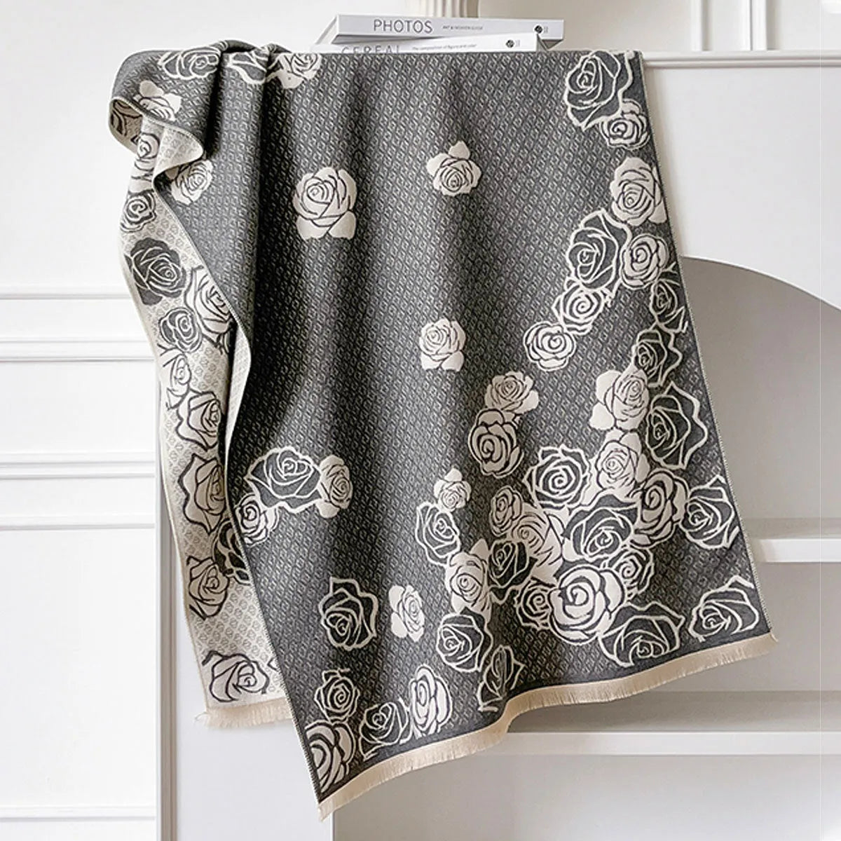 A grey imitation cashmere scarf with tassels, measuring 185 cm long, laid flat.