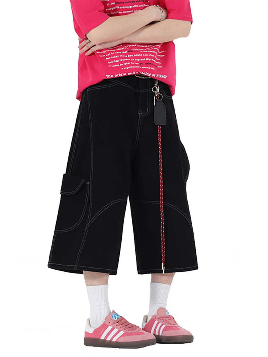 Retro multi-pocket denim workwear shorts in wide leg cropped design shown in red and black colours