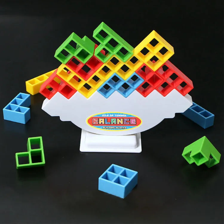 Plastic balance stacking game with 16 colourful building blocks on 26.5cm square chassis