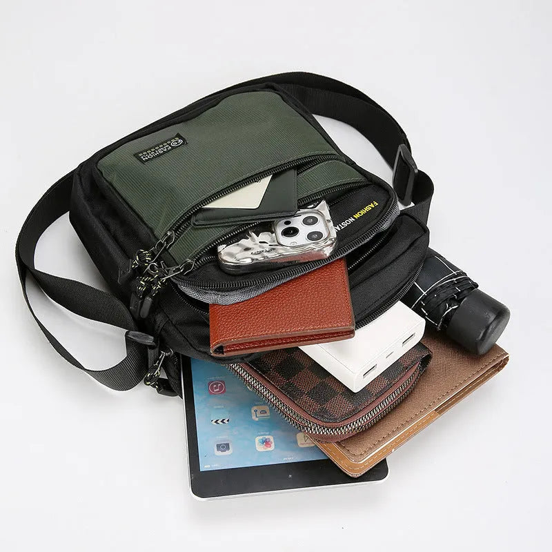 Men's waterproof nylon crossbody bag in solid colour with multiple compartments for outdoor and commuting use
