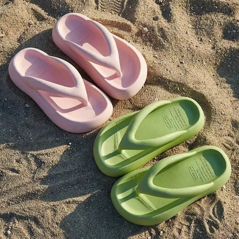 Women's solid colour EVA flip-flops with thick sole and decorative bow.