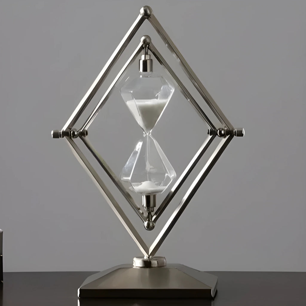 Glass sand timer with zinc alloy metal ornaments showing bronze or silver finish with white or black sand