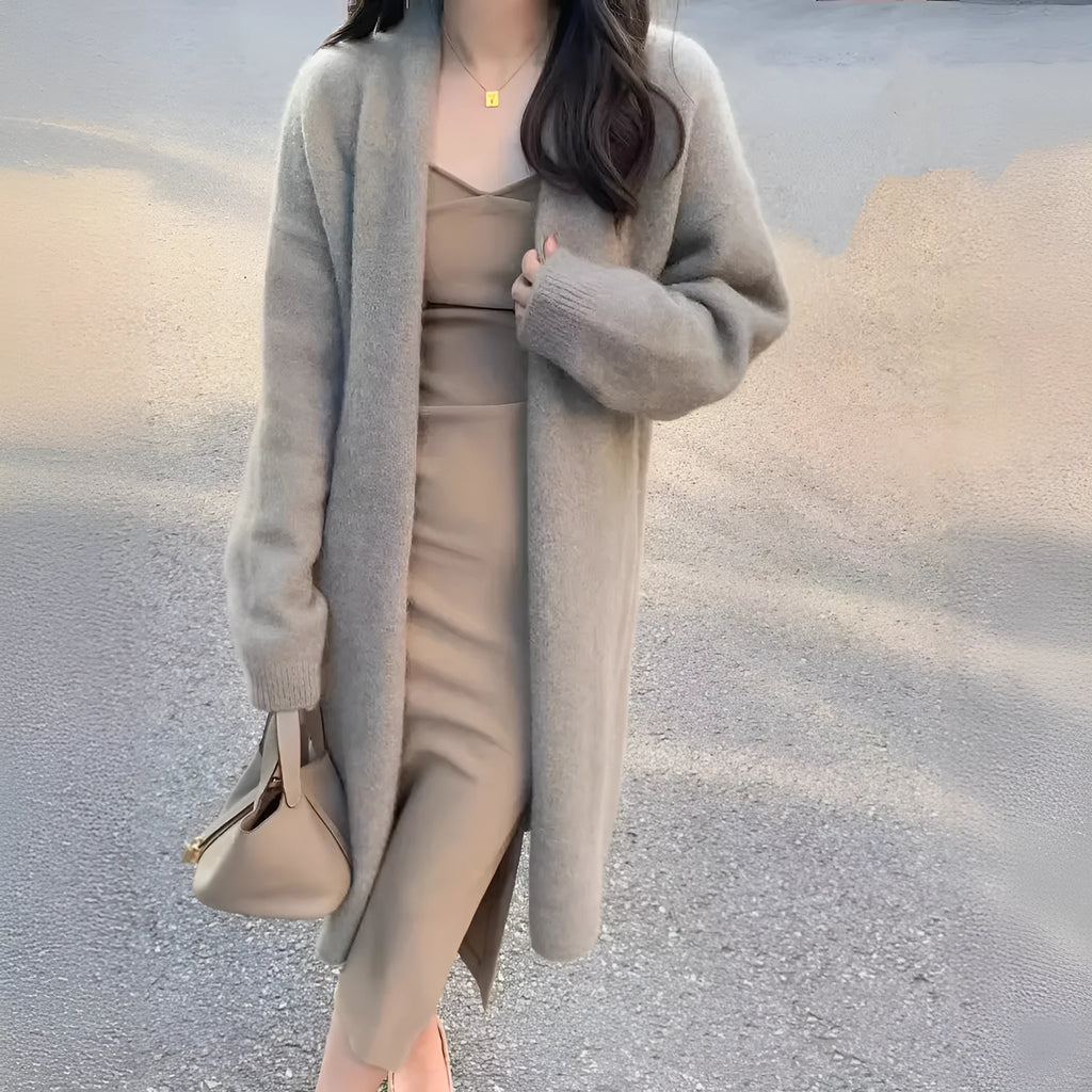 Women's khaki mid-length knitted cardigan with V-neck and long sleeves laid flat.