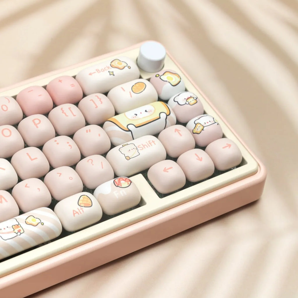PBT mechanical keyboard key cap set with steamed bread bear design showing thermal sublimation printing