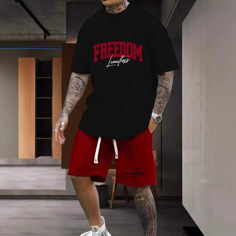 Men's grey sports suit with 3D printed letter design on short sleeve top and matching shorts