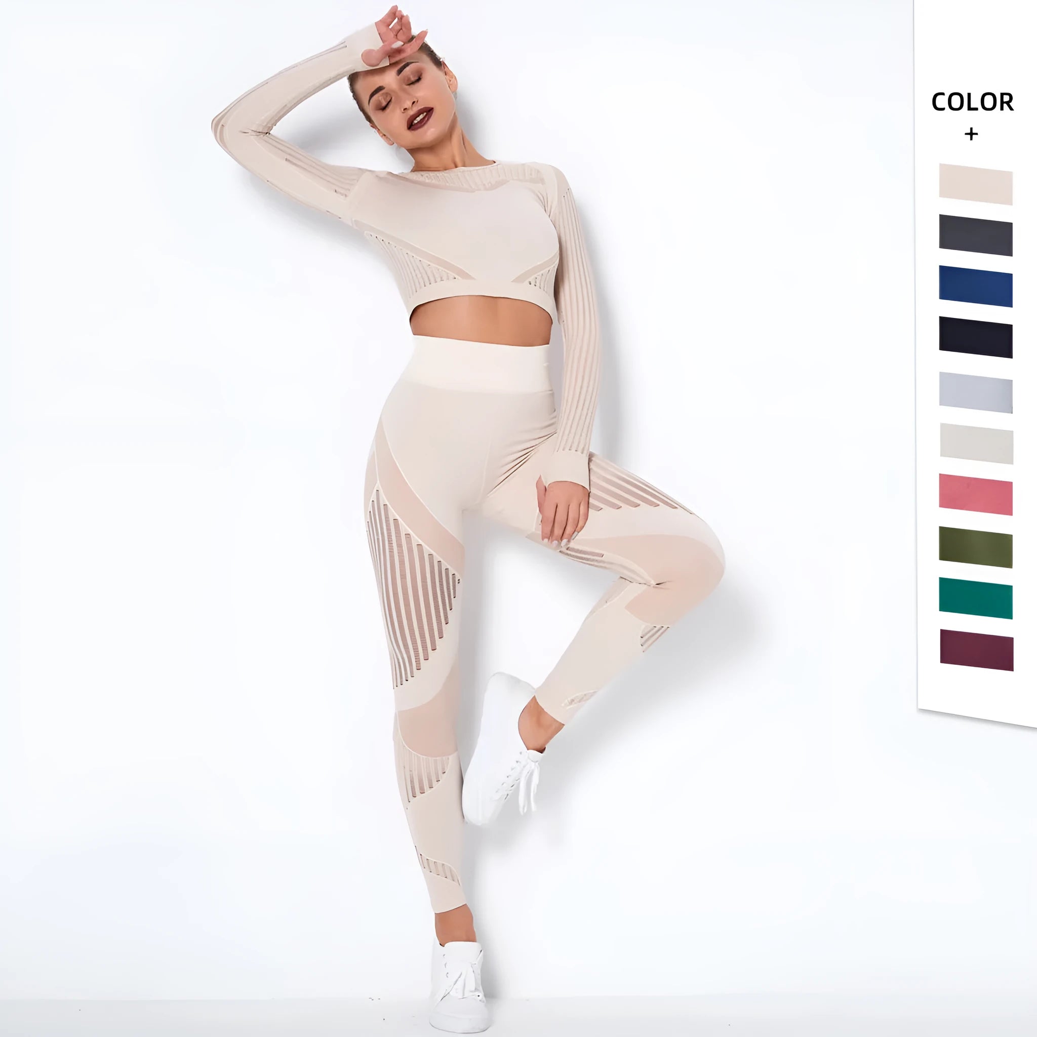 Woman wearing a seamless long-sleeved striped yoga suit in a stretch pose.