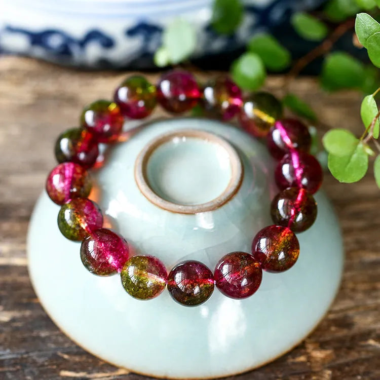 Watermelon crystal bracelet showing crystal beads on wrist, available in 6mm, 8mm, 10mm and 12mm sizes