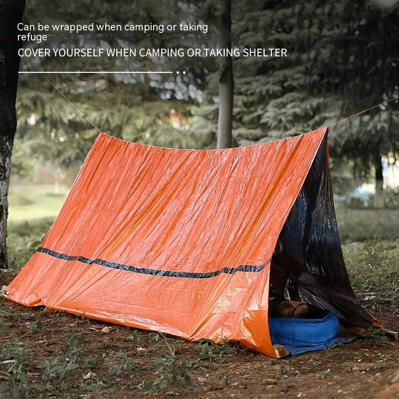 Portable outdoor disaster relief tent with sleeping bag and raincoat emergency shelter package