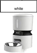 Automatic pet feeder for cats and dogs, 20x34x32.7cm, with food plate, power cord, adapter, and desiccant
