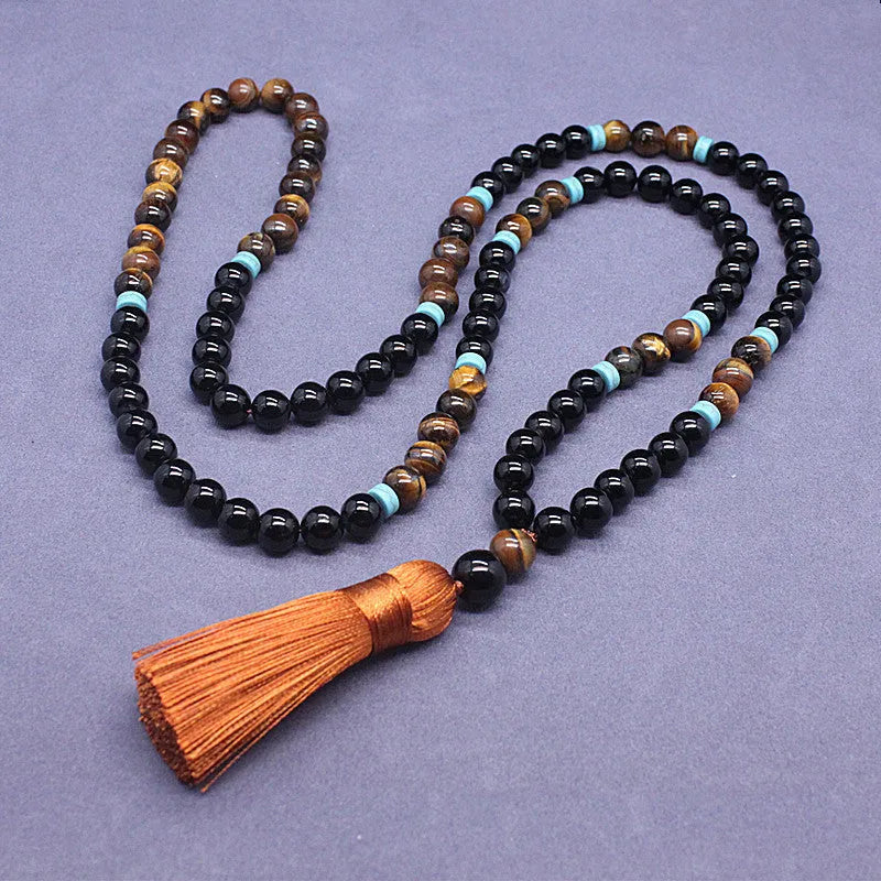 Geometric beaded jewellery set with black agate and tiger's eye stones showing bracelet and necklace options