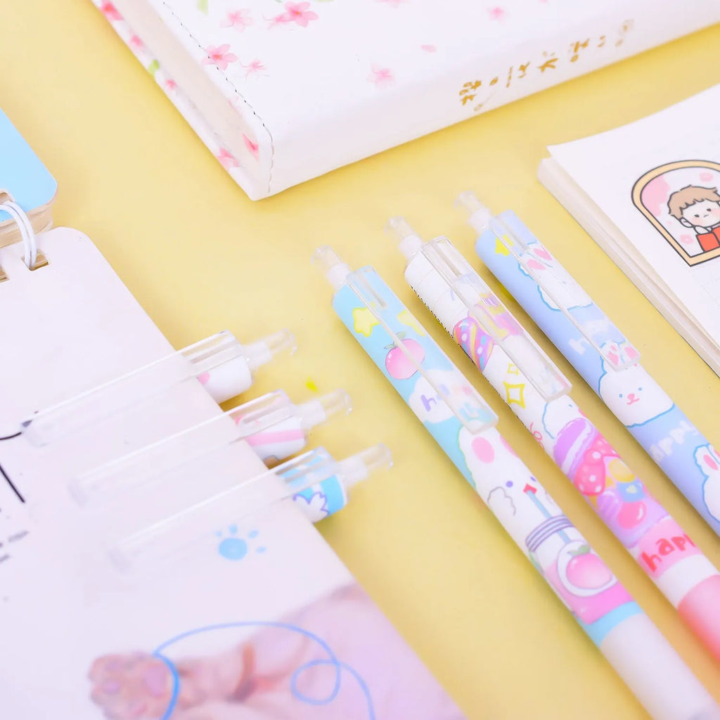 Six cartoon bunny decorated black ballpoint pens with 0.5mm tips on a white background.
