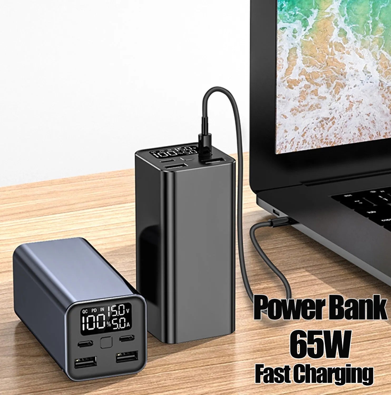 Black 65W metal power bank with 20000mAh capacity for charging laptops and phones.