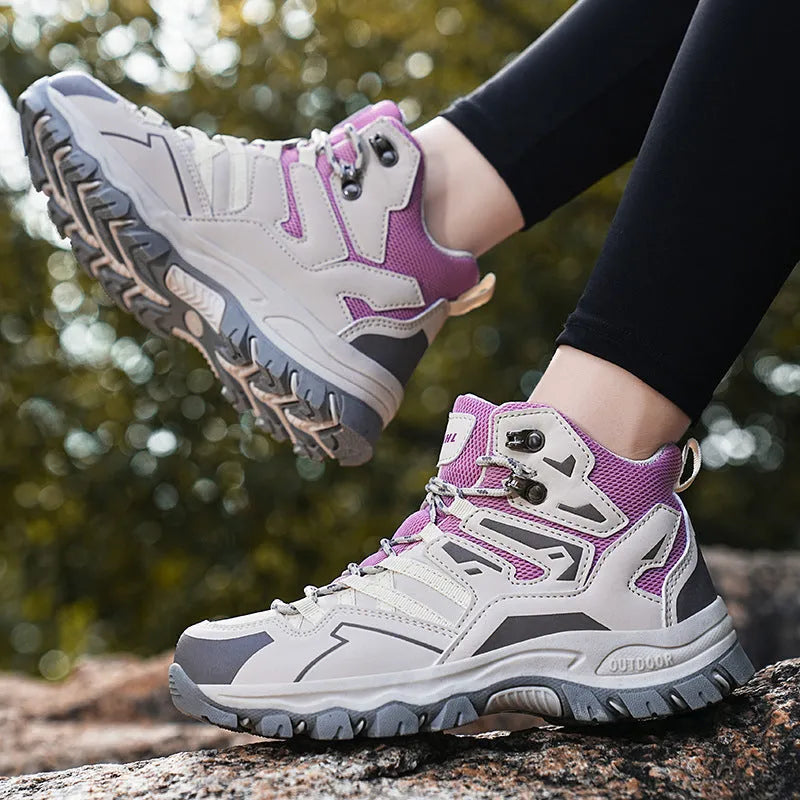 High-top outdoor hiking sneaker in flannel with rubber sole, shown on a rocky trail.
