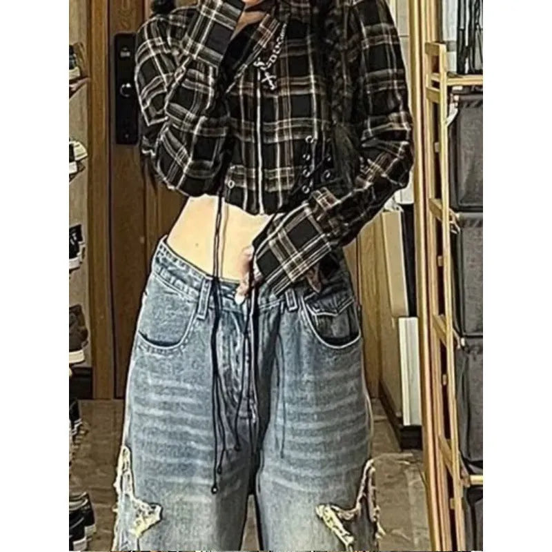 Blue high-waist wide-leg denim jeans showing straight cut design on mannequin