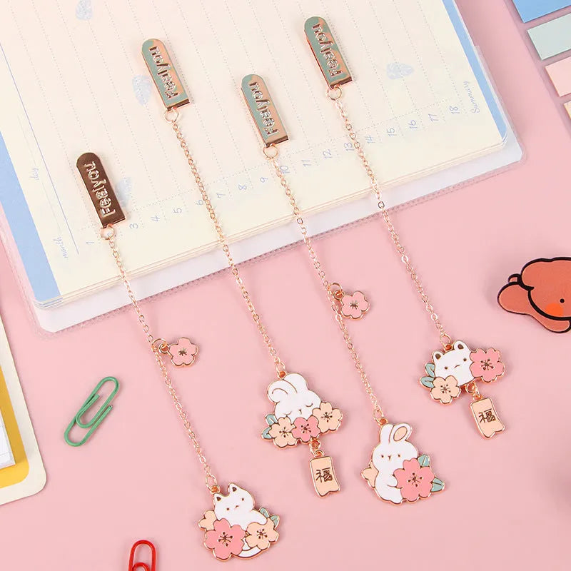 Metal pendant bookmark with cherry blossom cat design and sakura motifs