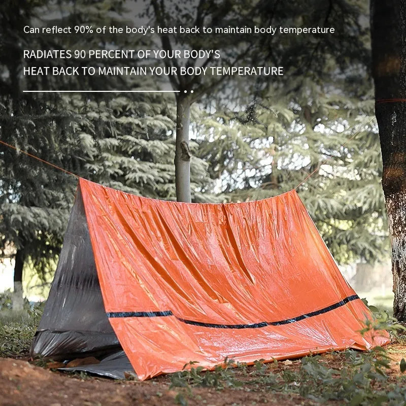 Portable outdoor disaster relief tent with sleeping bag and raincoat emergency shelter package
