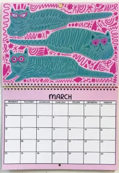 Cat calendar wall planner showing daily tear-off sheets with feline imagery
