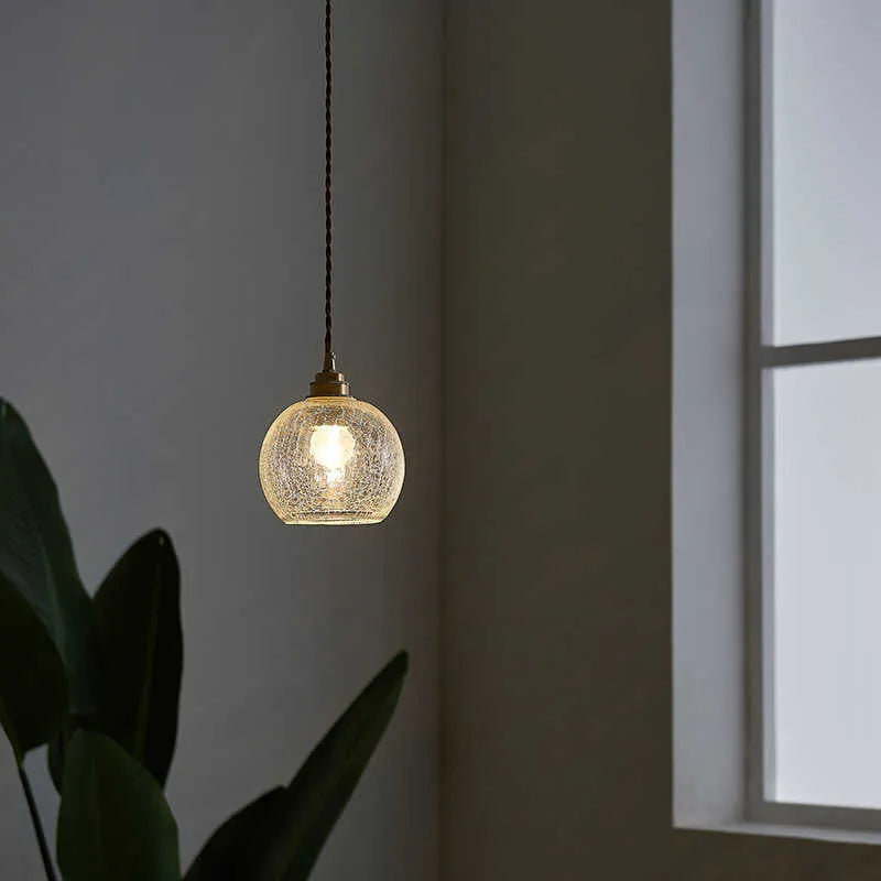Brass and glass ball chandelier ceiling light with copper electroplated finish.