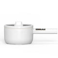 20cm multifunctional electric cooker with non-stick pot, plastic body, and glass lid on a table