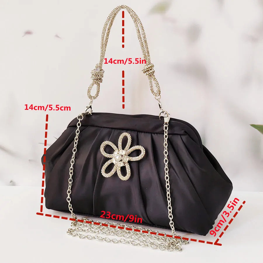 Women's soft polyester shell-shaped messenger bag in lavender purple with folds, diamond patterns, and a chain detail.