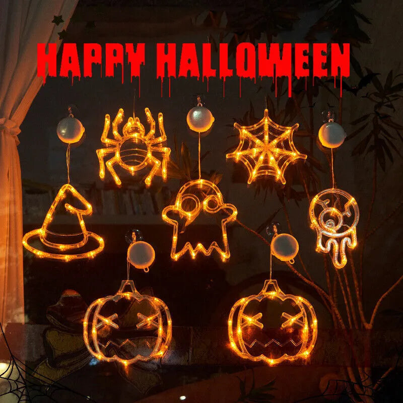 Seven Halloween LED window lights with spider, pumpkin, and ghost designs featuring suction cups for mounting