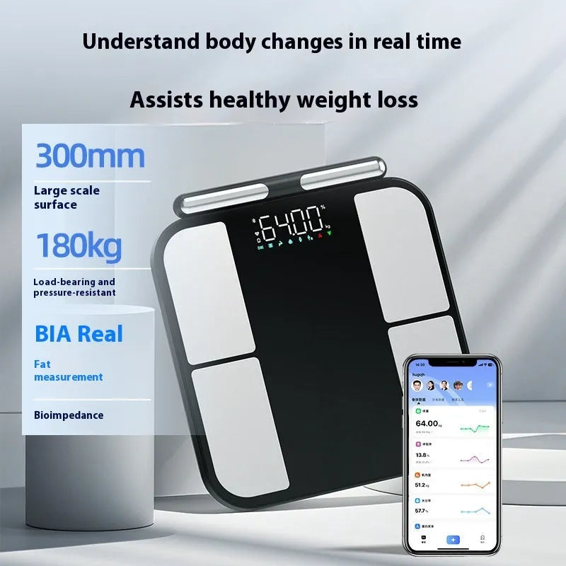 Black electronic weighing scale with tempered glass platform showing body fat and moisture measurements on colour screen