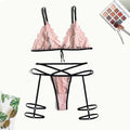 Pink lace hollow three-point lingerie set with leg straps, nylon fabric, side view on model