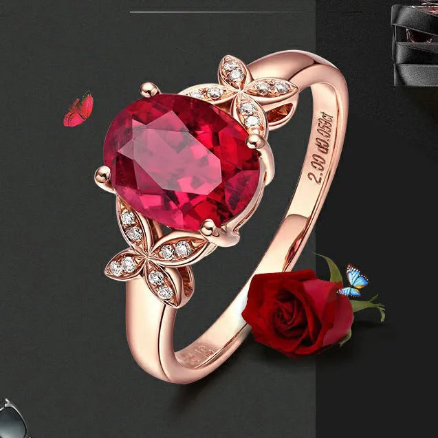 Women's rose gold plated butterfly ring with heart charm in red or blue colour options