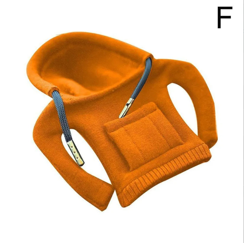 Cloth gear shift knob hoodie cover shown in multiple colours next to a car gear lever.