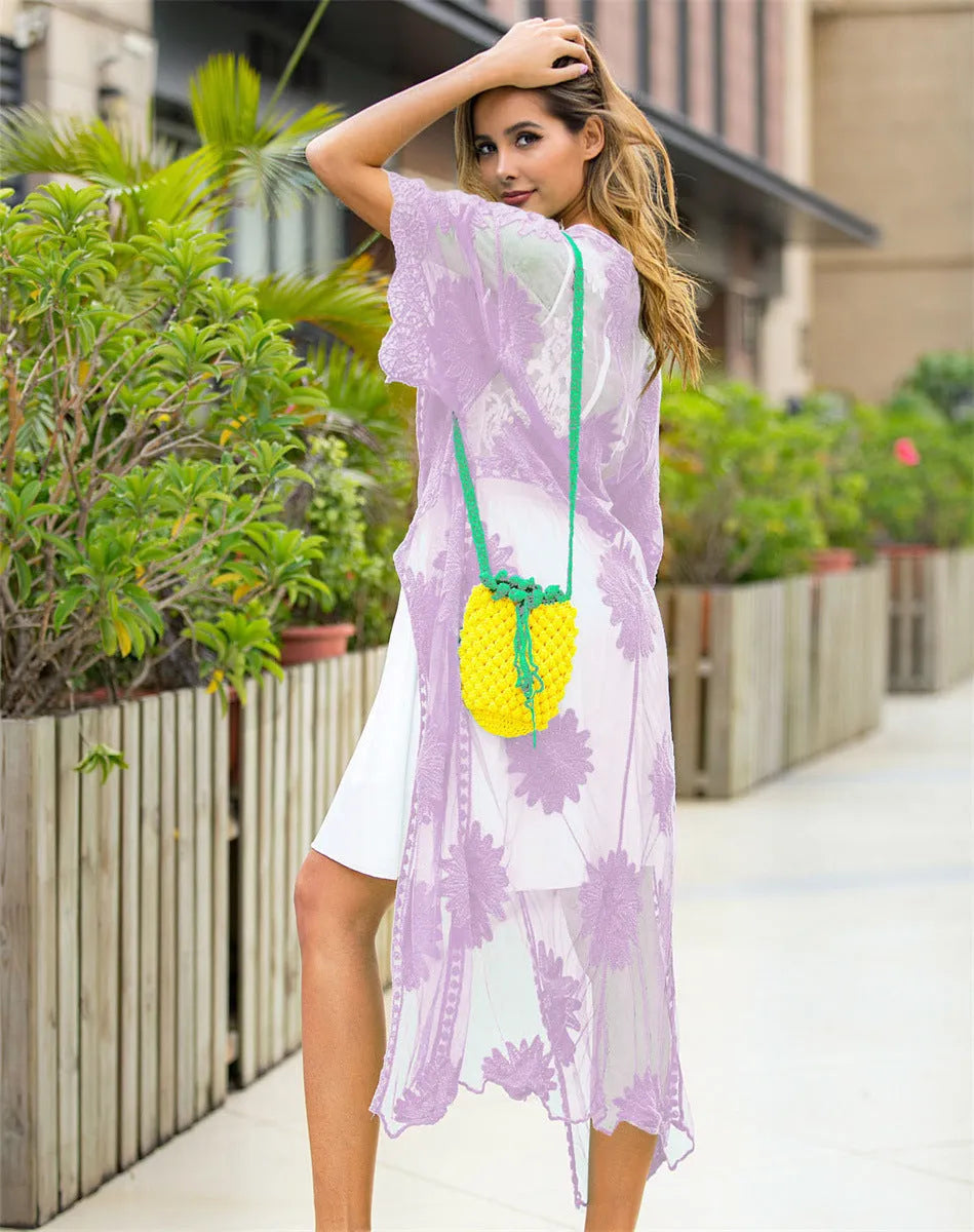 Light purple lace embroidery beach dress swimsuit cover-up on a hanger.